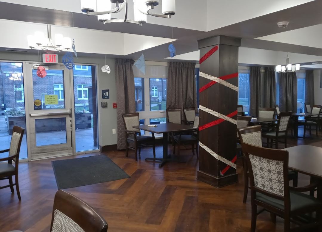 A cozy dining area with elegant decorations and ample natural light.