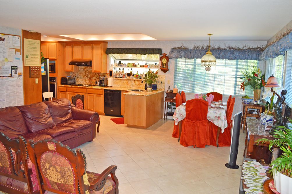 A cozy open-plan living space combining the kitchen and dining area.