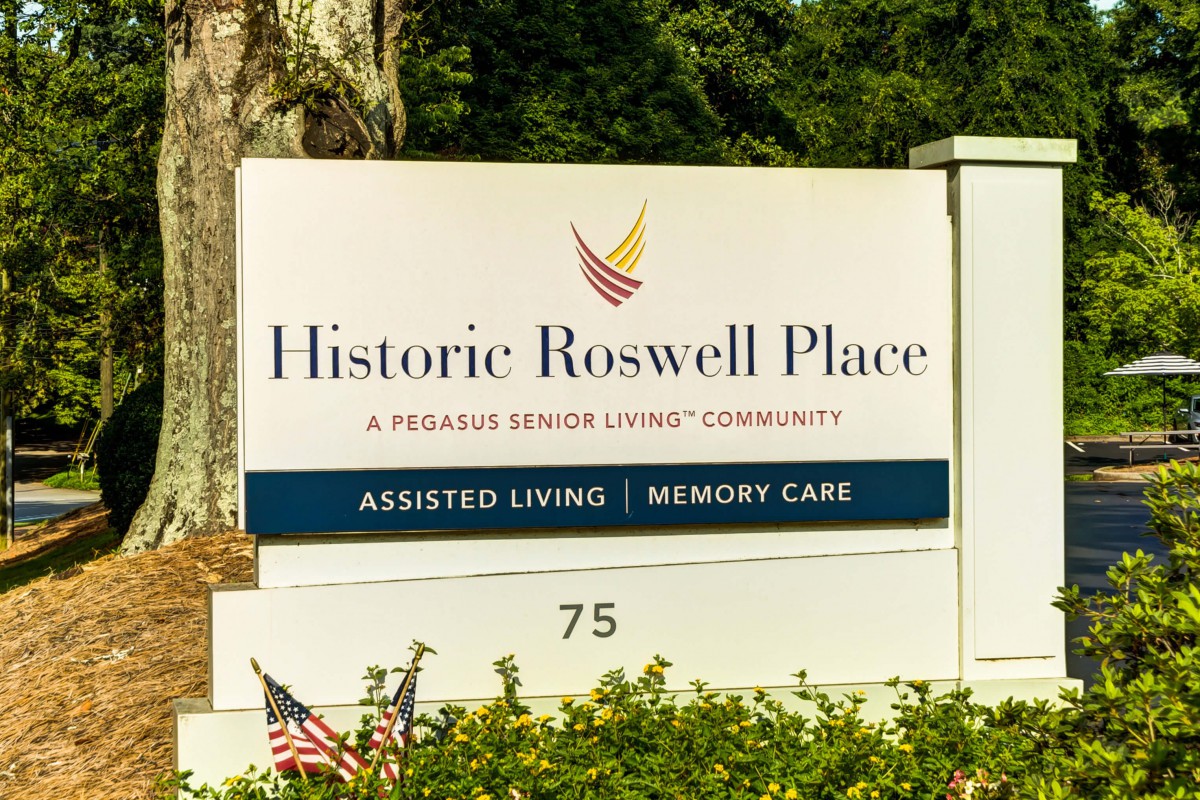 Sign for Historic Roswell Place, an assisted living and memory care community.