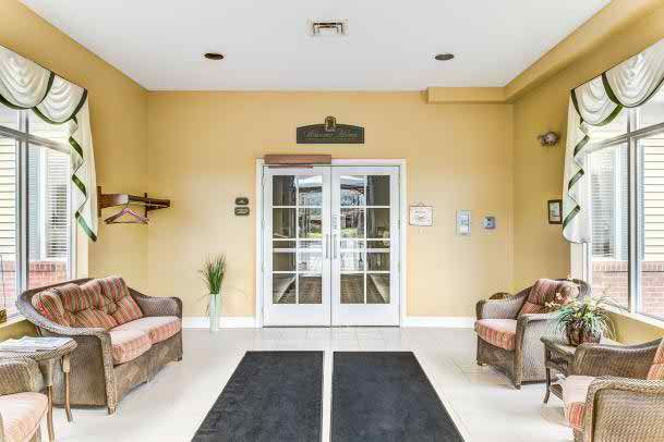 A welcoming lobby with double doors and comfortable seating.