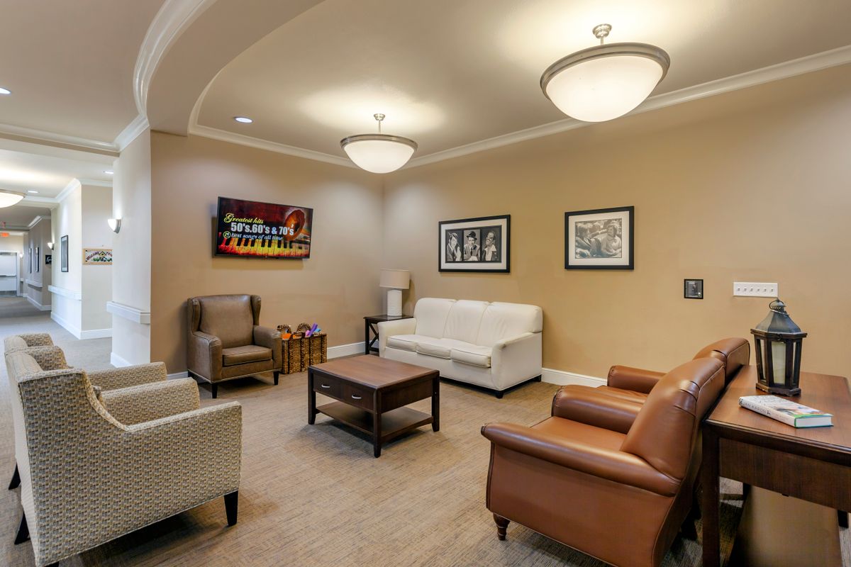 A cozy living room with comfortable seating and modern decor.