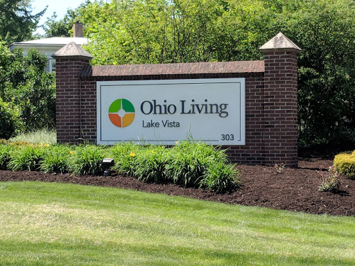 Entrance sign for Ohio Living Lake Vista amidst a lush green landscape.