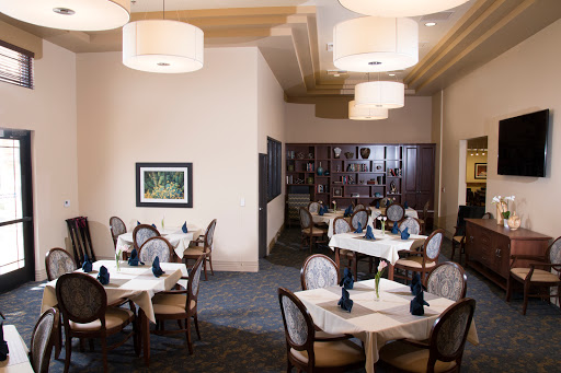 A beautifully designed dining area with elegant tables and ambient lighting.
