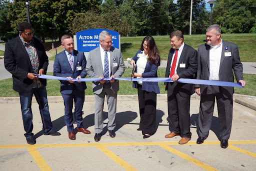 Local leaders gather for a ribbon-cutting ceremony to mark the opening of a new facility.
