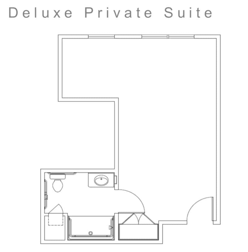 Floor plan of a Deluxe Private Suite featuring a bathroom and main living area.
