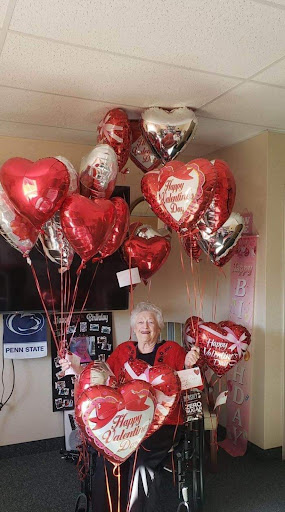A joyful celebration filled with heart-shaped balloons!