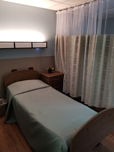 A serene spa room prepared for a relaxing massage session.