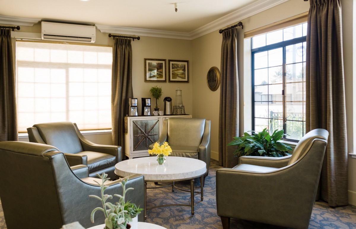 A cozy living room with stylish furniture and natural light.