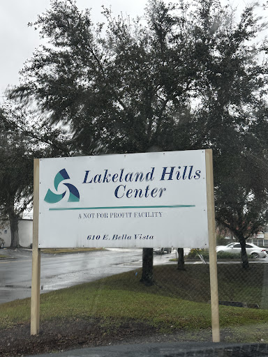 Sign for Lakeland Hills Center on a rainy day.
