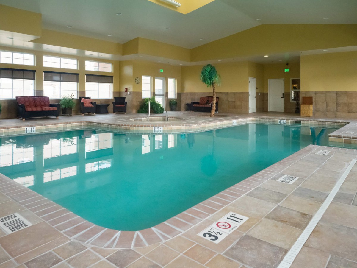 An inviting indoor swimming pool in a hotel setting.
