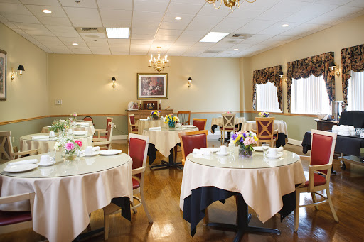 A cozy and elegantly arranged dining room, ideal for special occasions.