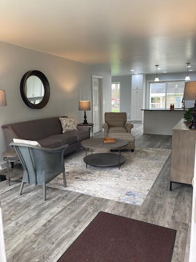 A cozy and modern living room featuring stylish furniture and a welcoming atmosphere.