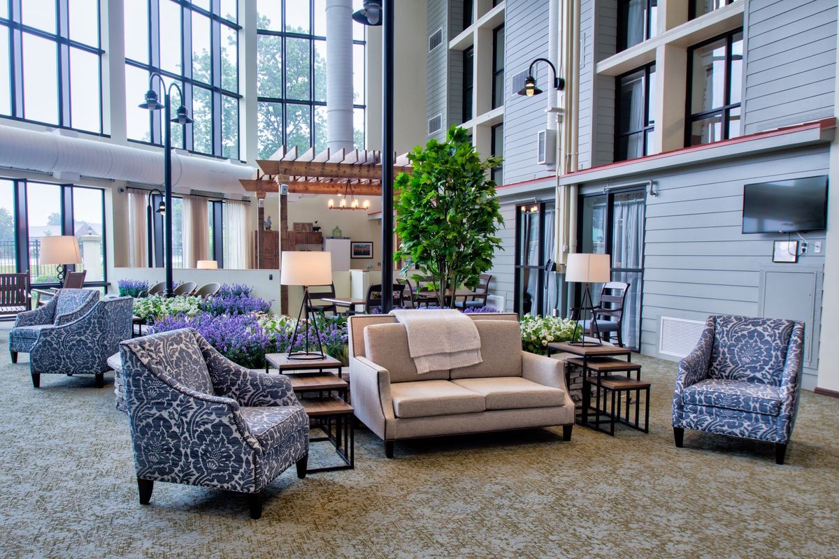 A modern hotel lobby with comfortable seating and stylish decor.