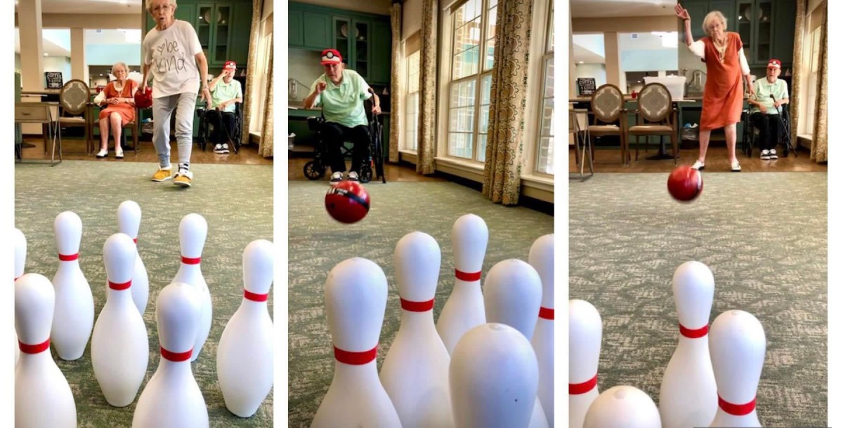 A senior enjoying an indoor bowling game.