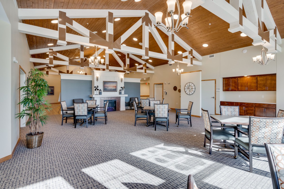 A spacious and well-lit lobby area with furniture arranged for comfort and style.