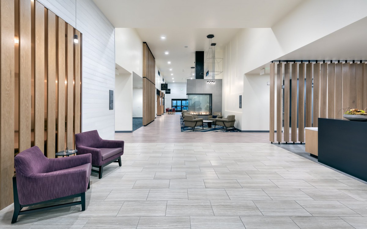 A modern lobby area with stylish furniture and contemporary design elements.