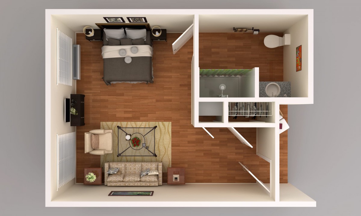 A top-view floor plan of a one-bedroom apartment showcasing a living area, bedroom, kitchen, and bathroom.