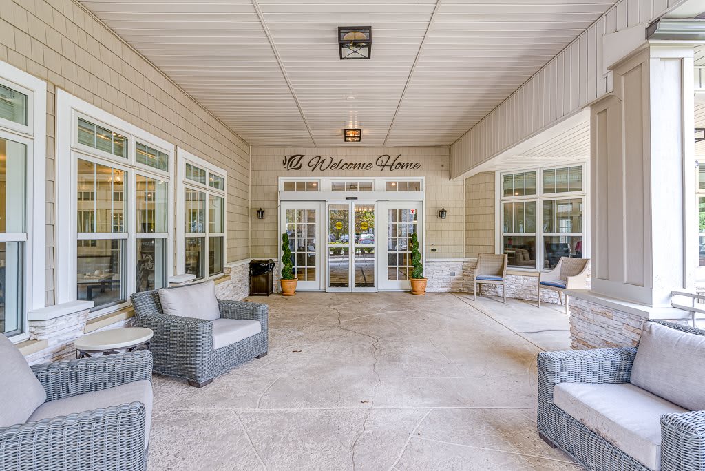 A welcoming entrance lobby with comfortable seating and large windows.