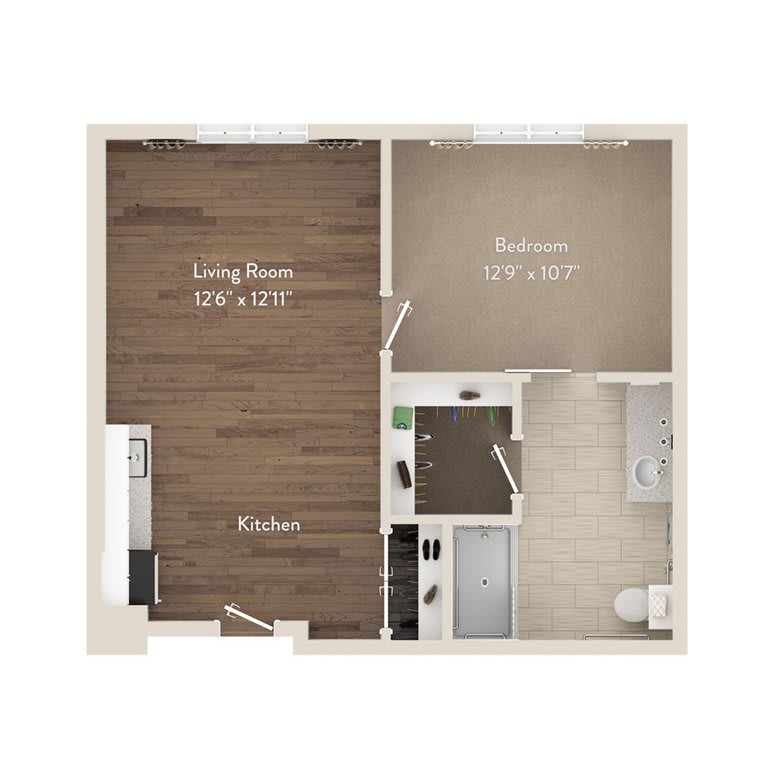A floor plan of a one-bedroom apartment featuring a kitchen, living room, and bedroom.