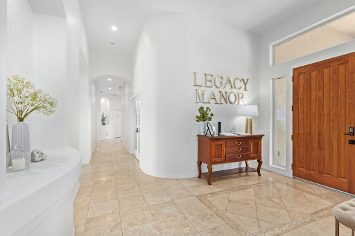A sophisticated foyer of Legacy Manor showcasing modern design and elegance.