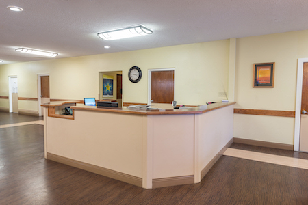 A spacious and welcoming reception area in an office setting.