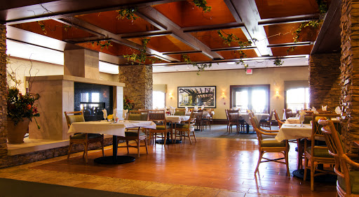 A cozy dining area with wooden accents and a warm ambiance.