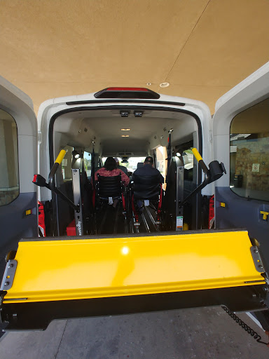 A view of the interior of a wheelchair-accessible van, showcasing its seating and accessibility features.