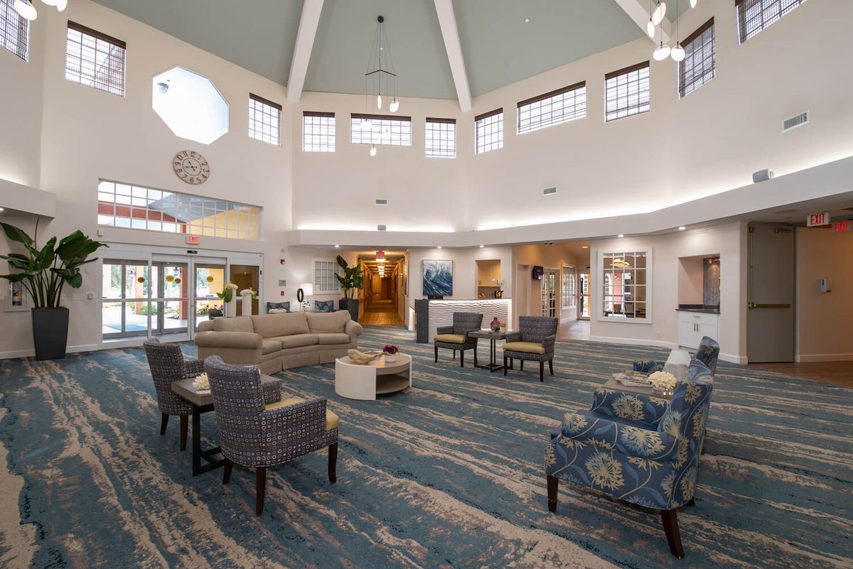 A spacious lobby with comfortable seating and modern decor.