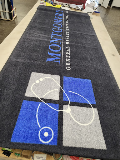 A branded mat featuring the logo of Montford General Hospital.