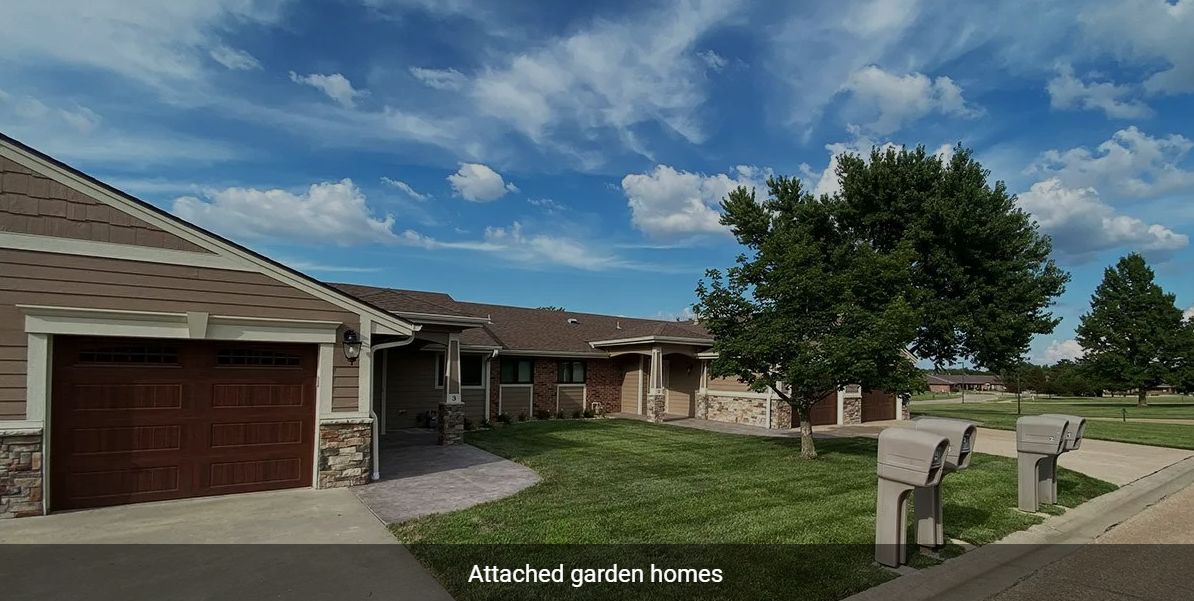 Suburban attached garden homes on a sunny day.