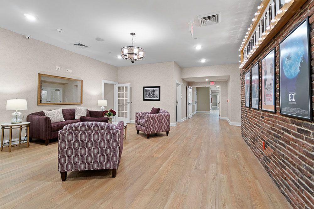 A spacious, modern living room with comfortable seating and elegant decor.