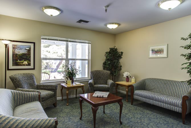 A cozy living room with comfortable seating and natural light.