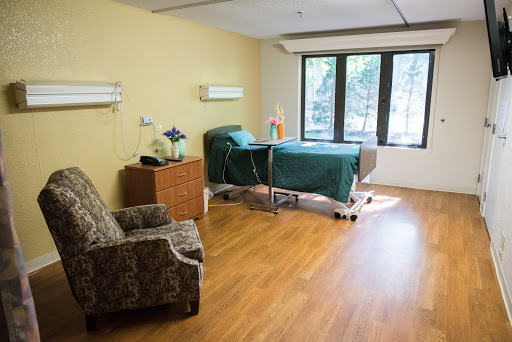 A serene hospital patient room designed for comfort and care.