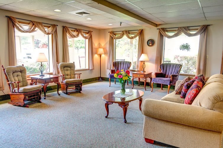A cozy living room with comfortable seating and natural light.