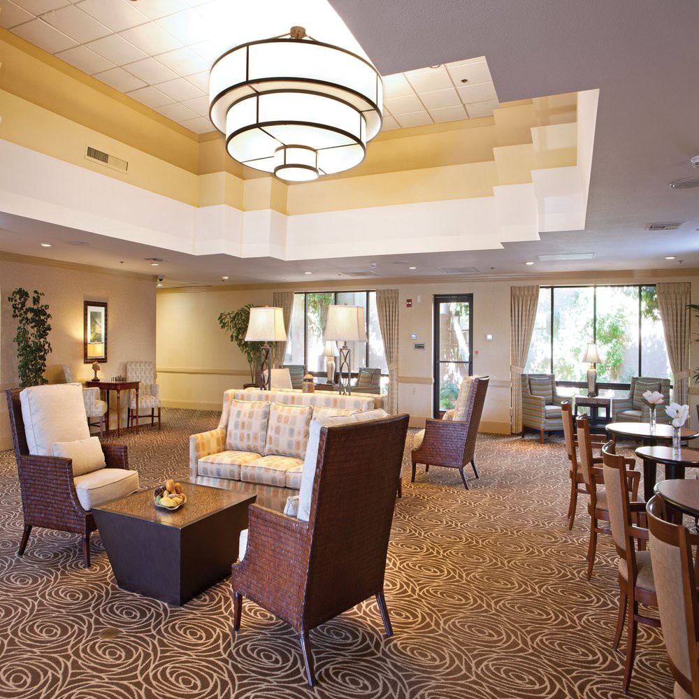 A spacious and well-lit lobby with comfortable seating and elegant decor.