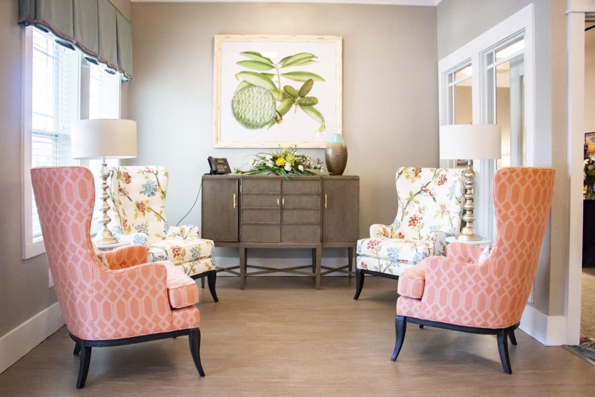 A cozy living room with stylish chairs and elegant decor.