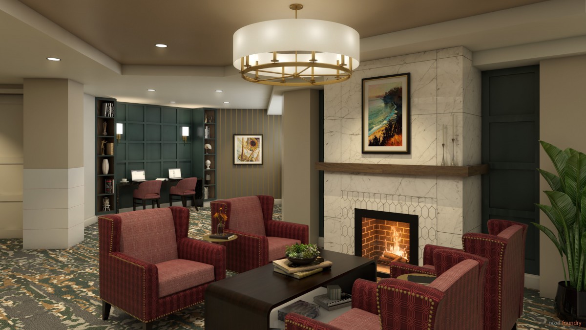 A cozy lounge area with a fireplace, surrounded by comfortable seating and modern decor.