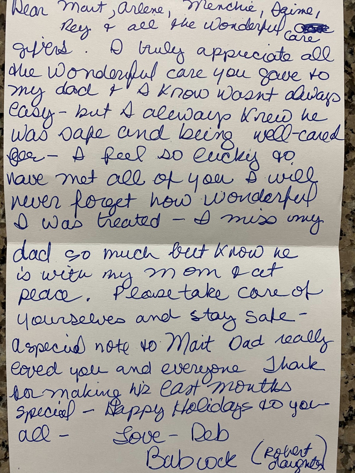 A heartfelt handwritten letter expressing love and gratitude, written in blue cursive ink.