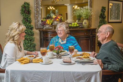 A joyful meal shared among family, showcasing delicious food and warm conversation.