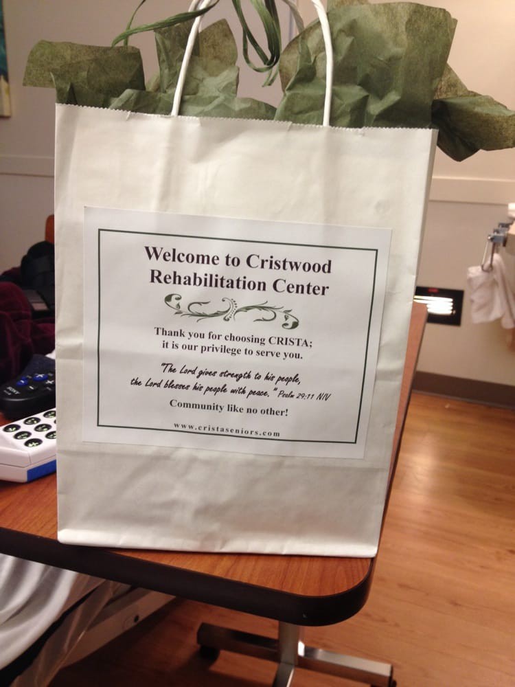 A welcome bag from Crisenod Rehabilitation Center placed on a table.