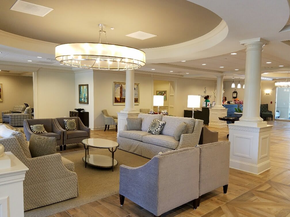 A modern lobby with comfortable seating and elegant lighting.