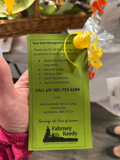 A green pamphlet detailing care management services with contact information.