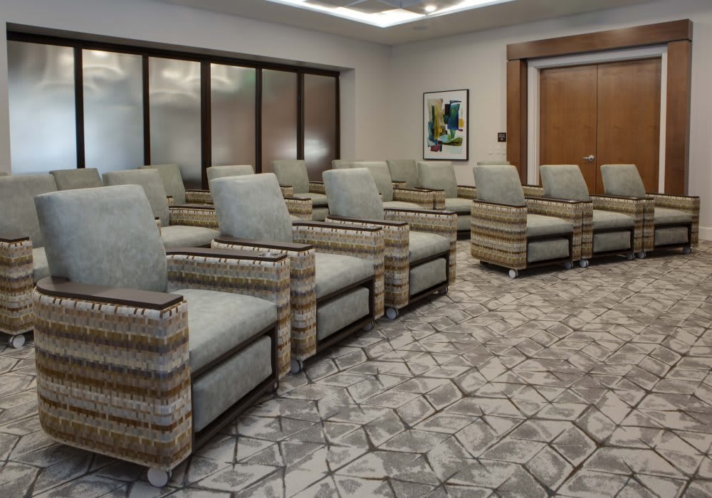 A modern waiting room with comfortable seating and stylish decor.