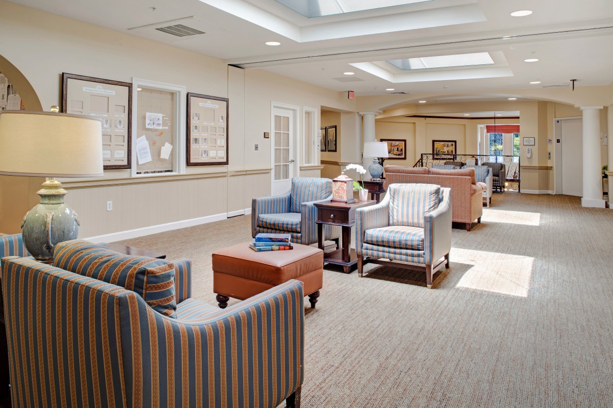 A cozy lobby with comfortable seating and soft lighting.