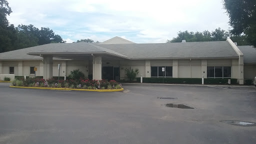 A modern facility with a landscaped entrance.