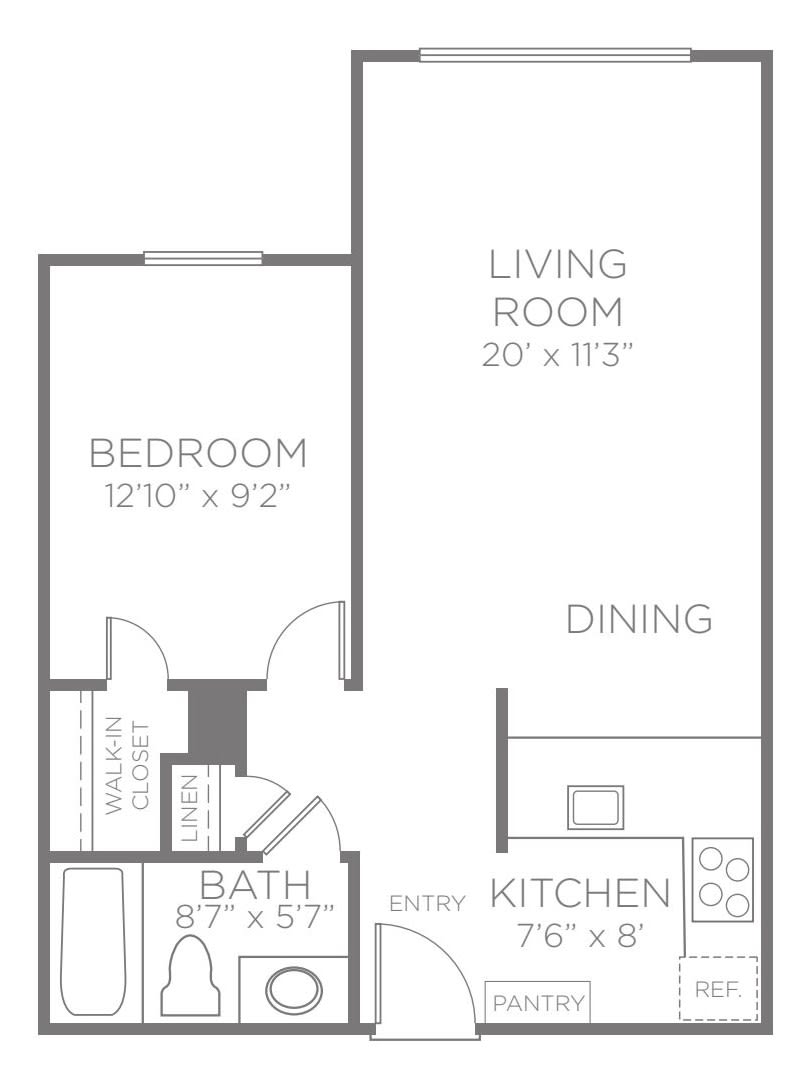 A simple one-bedroom apartment floor plan with a living room, kitchen, and bathroom.