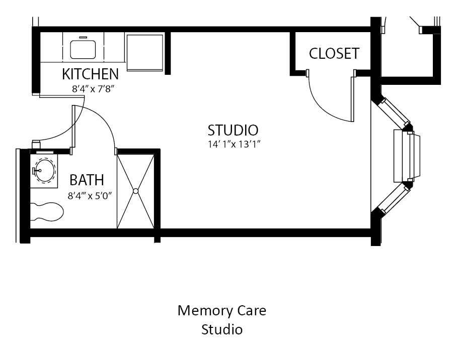 Floor plan of a memory care studio apartment, featuring a kitchen, bath, closet, and main living area.