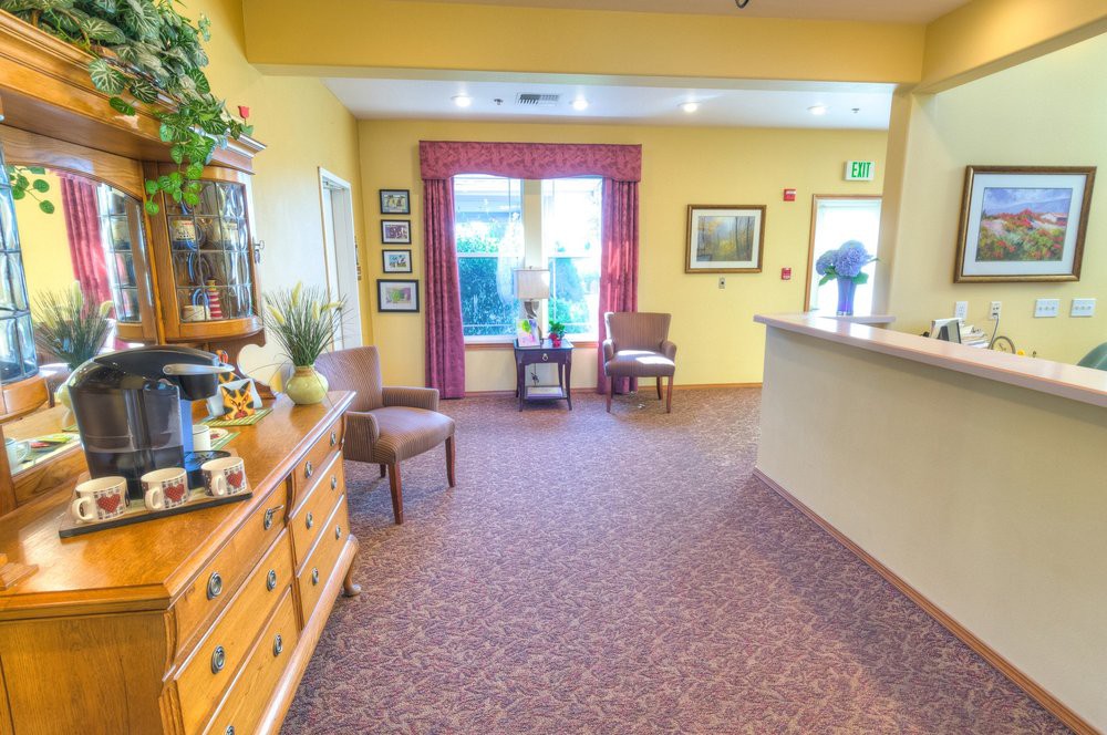 A cozy reception area with comfortable chairs and stylish decor.
