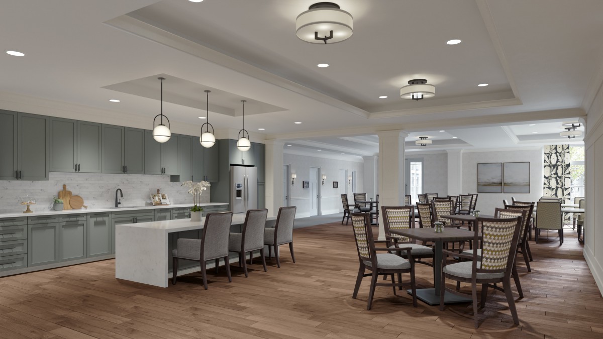 A spacious, modern dining and kitchen area with elegant furnishings and lighting.
