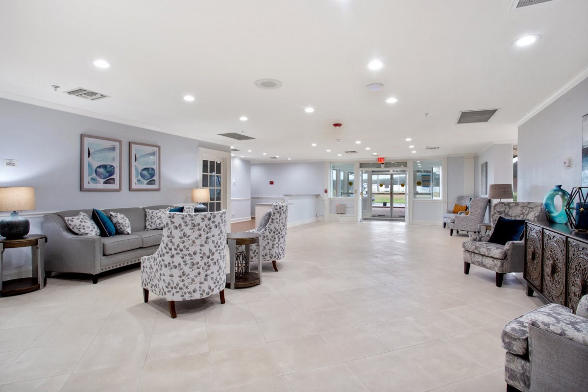 A spacious and modern lobby with comfortable seating and bright lighting.